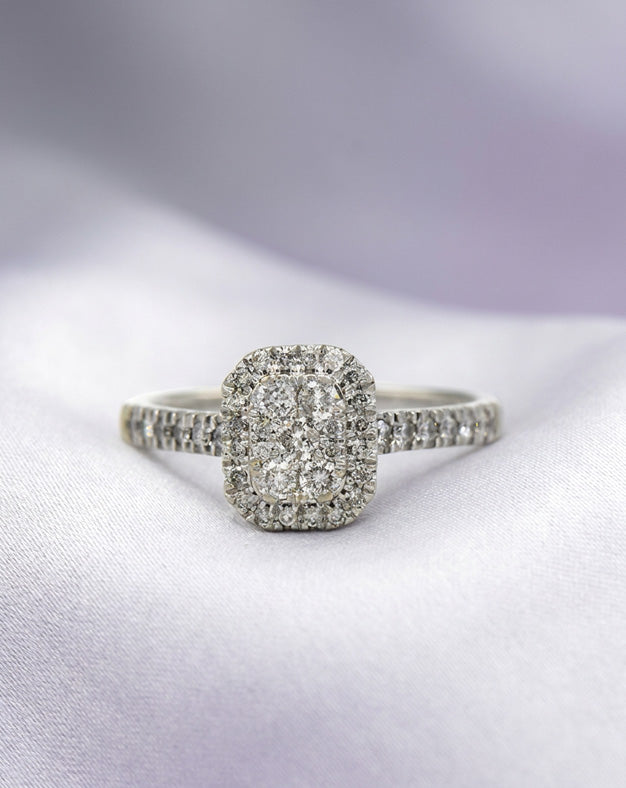 0.50ctw Cushion-Shape Diamond Cluster Ring with Halo and Pavé Band in 10k White Gold — lifestyle photography
