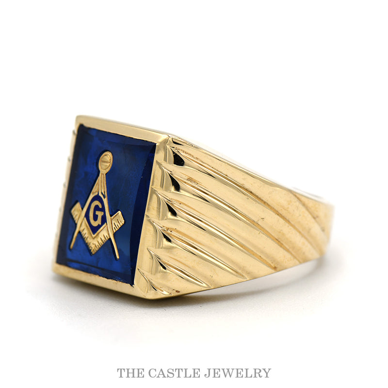 Side profile of the 10k yellow gold Masonic ring showing fluted shoulders