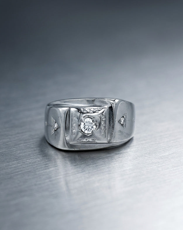 Men's 0.20cttw Three Diamond Ring with Arrow Design Accents in 14k White Gold — lifestyle photography