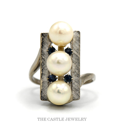 14k white gold three pearl shield ring with sapphire accents — top view