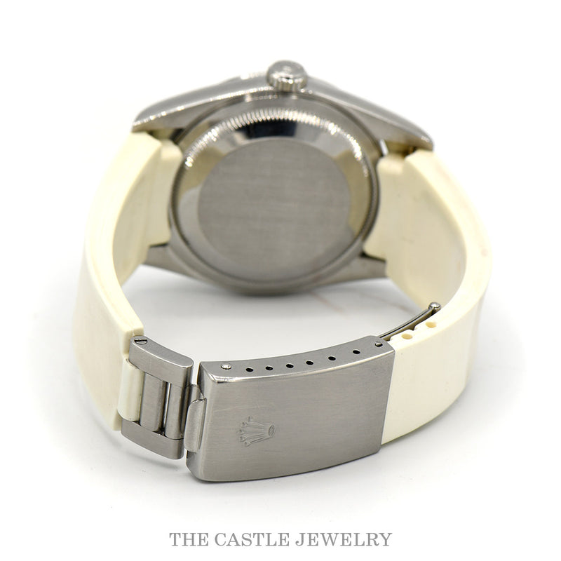 Caseback on white rubber strap with Rolex deployment buckle