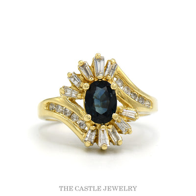 Oval sapphire bypass ring with .25cttw diamond accents in 14k yellow gold — top view
