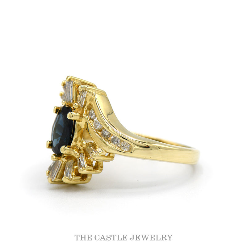 Side profile of the oval sapphire bypass ring showing the fanned baguettes and channel-set arm