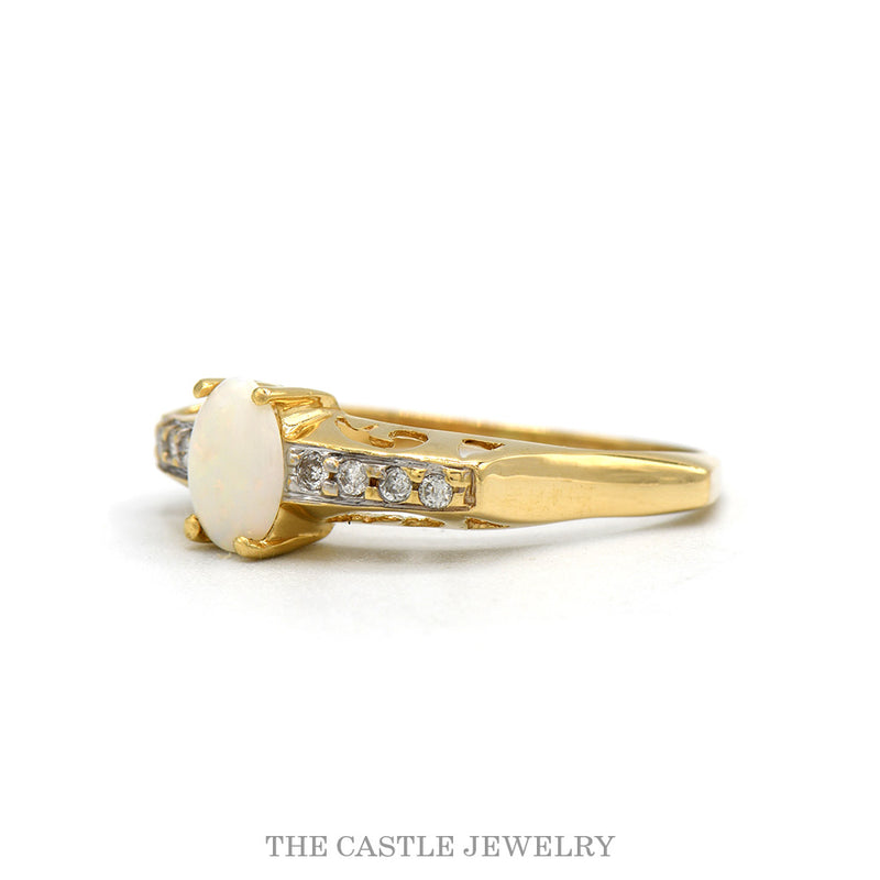 Side profile of the 10k yellow gold opal diamond ring
