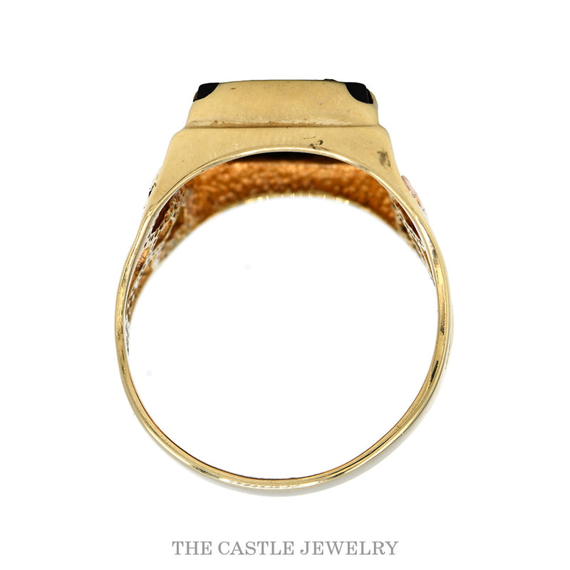 Front-facing view of the square black onyx eagle ring in 10k tri gold