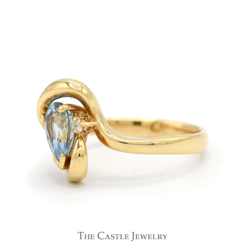 Pear Shaped Blue Topaz Ring with Diamond Accent in Freeform Swirled 14k Yellow Gold Mounting