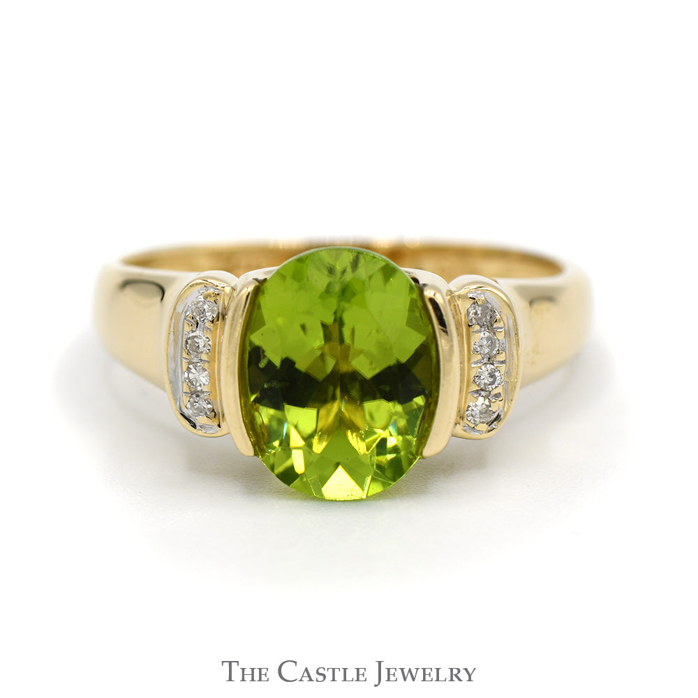 Oval Peridot Ring with Vertical Set Diamond Accents in 14k Yellow Gold