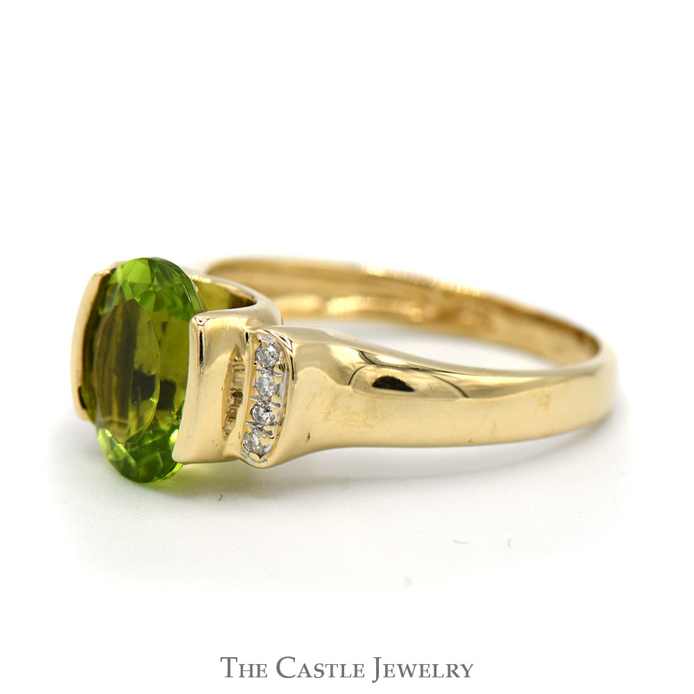 Oval Peridot Ring with Vertical Set Diamond Accents in 14k Yellow Gold