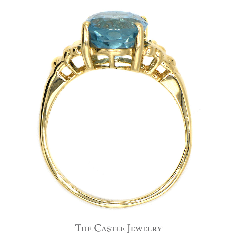 Oval Blue Topaz Ring with Beaded Split Sides in 14k Yellow Gold