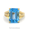 Emerald Cut Blue Topaz Ring with Polished Tapered Sides in 10k Yellow Gold - Thumbnail 1