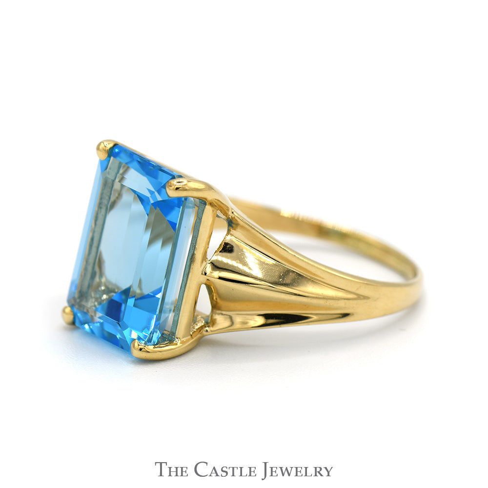 Emerald Cut Blue Topaz Ring with Polished Tapered Sides in 10k Yellow Gold