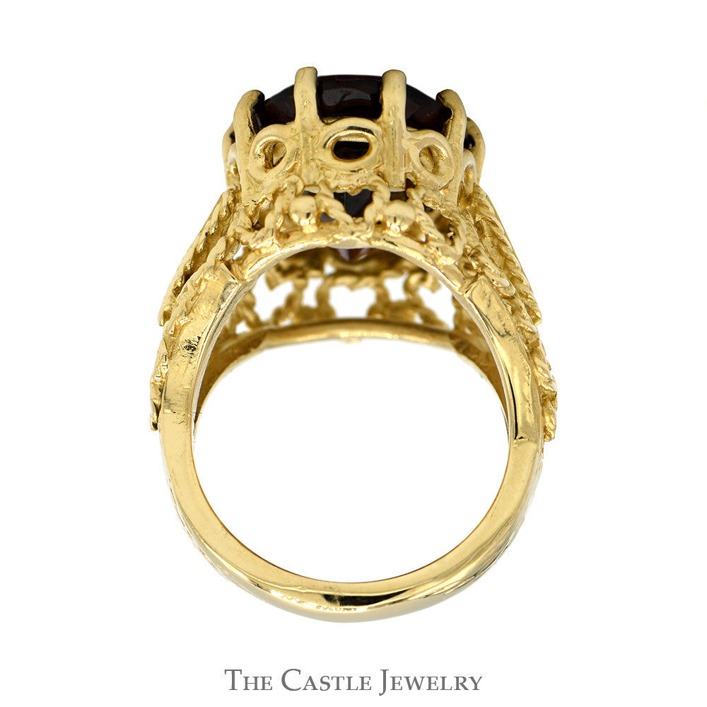 Oval Garnet Ring in Open Rope Designed Mounting in 14k Yellow Gold