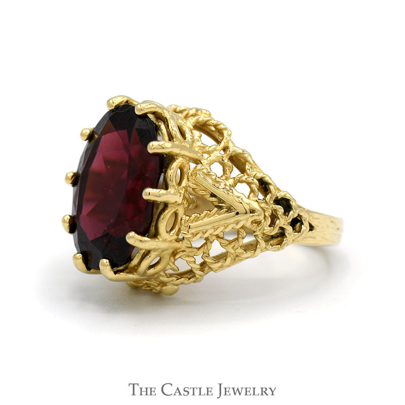 Oval Garnet Ring in Open Rope Designed Mounting in 14k Yellow Gold