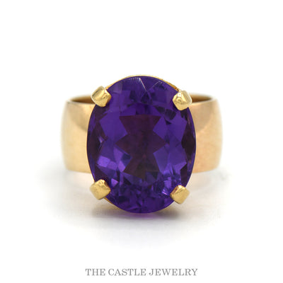 14k yellow gold large oval amethyst solitaire ring with 8mm polished band — top view