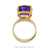 Front-facing view of the large oval amethyst solitaire ring on a polished 14k yellow gold band - Thumbnail 3