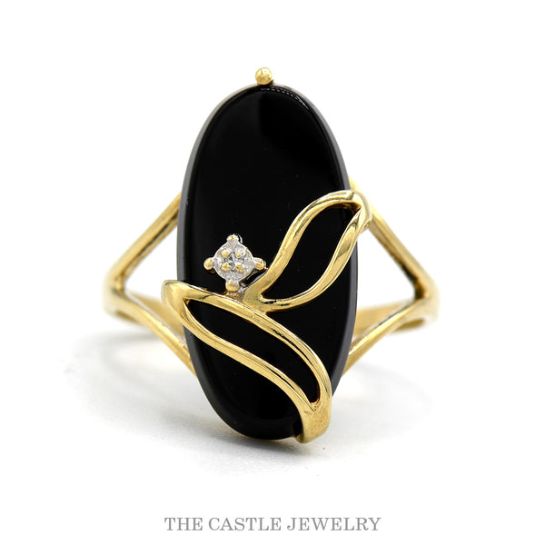 10k yellow gold elongated oval black onyx ring with diamond accent — top view