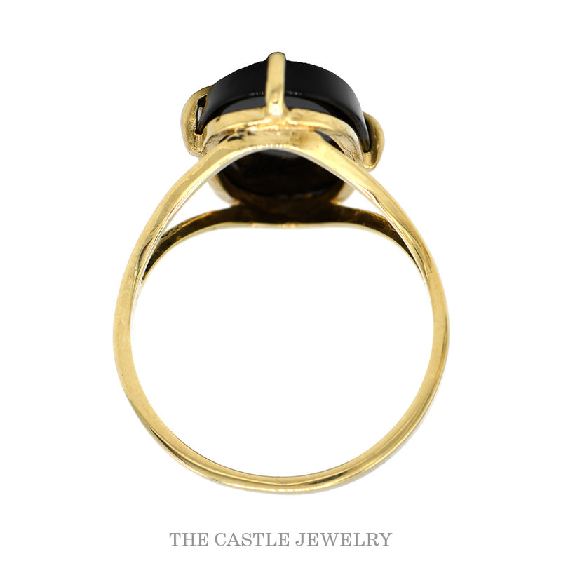 Front-facing view of the elongated black onyx ring with freeform gold sweep in 10k yellow gold