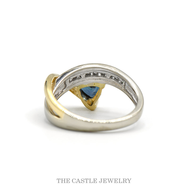 Front-facing view of the trillion mystic topaz bypass ring in 14k two tone gold