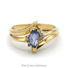 Marquise Shaped Tanzanite Ring with Diamond Accents and Split Shank Sides in 14k Yellow Gold - Thumbnail 1