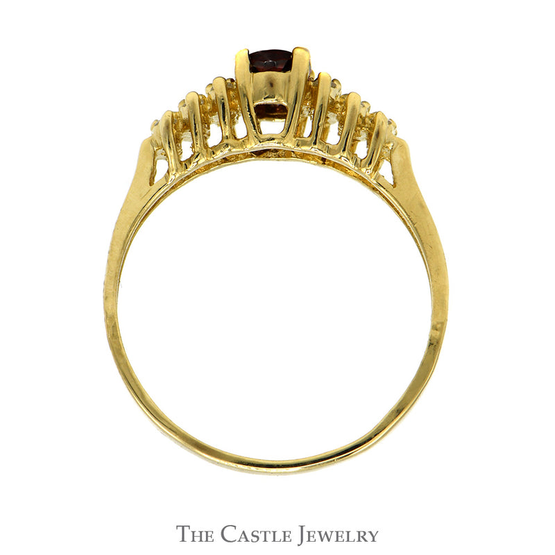 Oval Cut Garnet And Diamond Ring With  .18 CTTW Diamonds In 14KT Yellow Gold