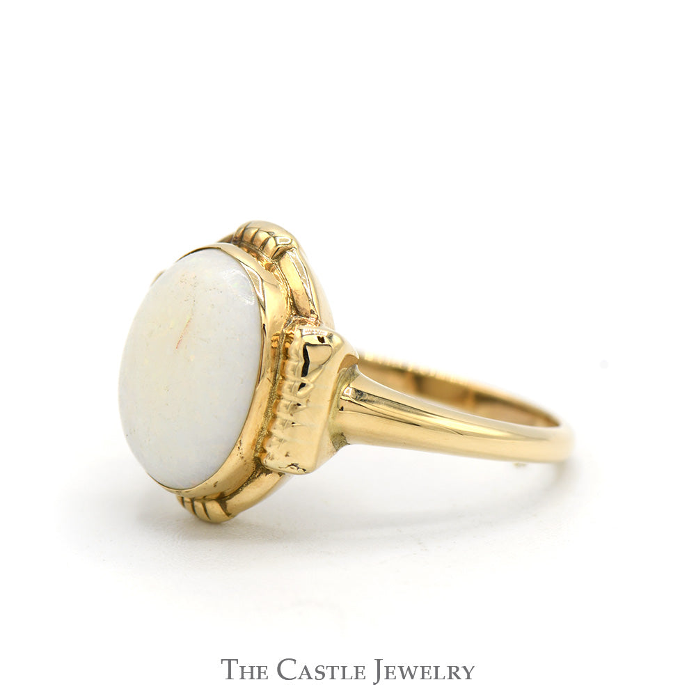 Oval Cut Opal Ring with Bar Designed Accented Sides in 10k Yellow Gold