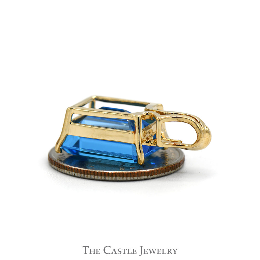 Emerald Cut Blue Topaz Pendant with Curved Bail in 10k Yellow Gold