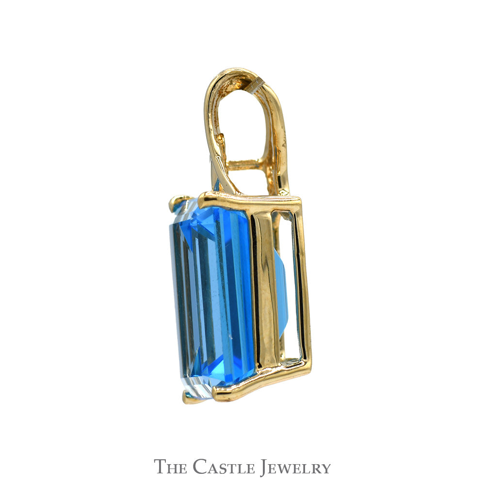 Emerald Cut Blue Topaz Pendant with Curved Bail in 10k Yellow Gold