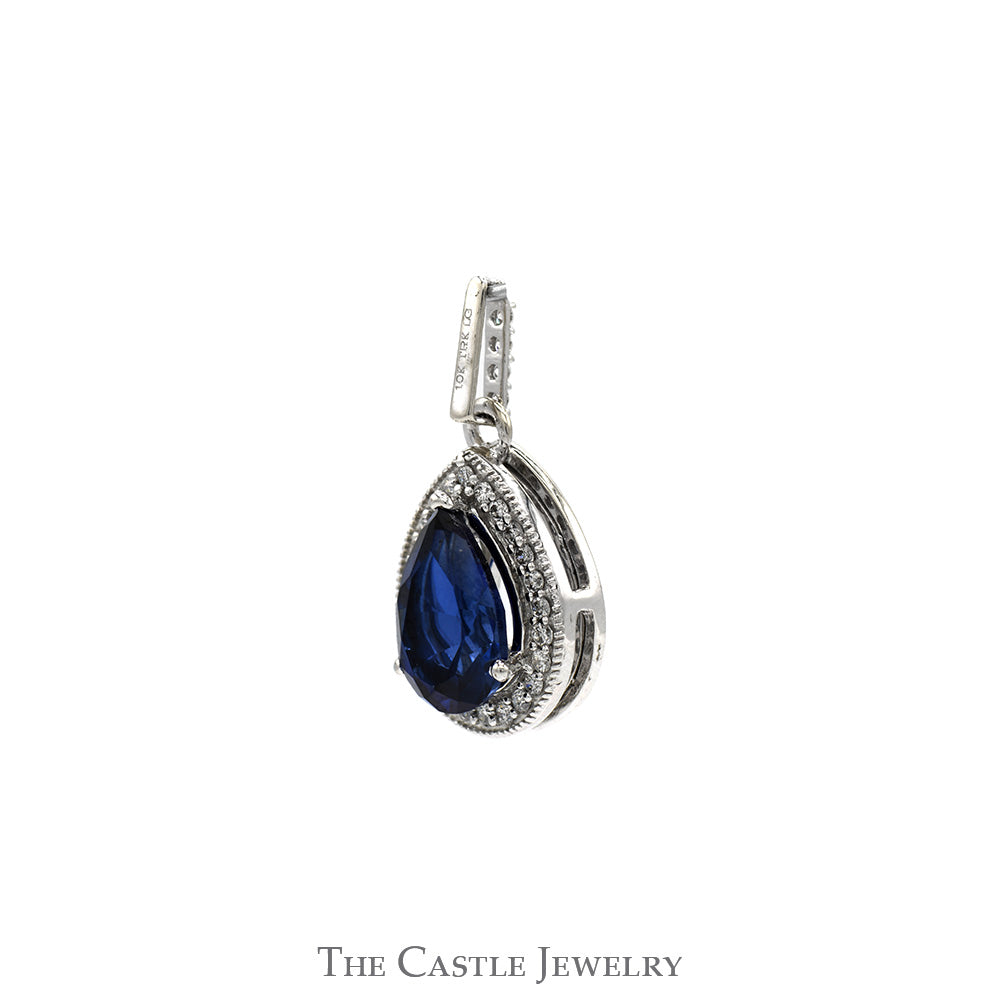 Pear Cut Sapphire Pendant with Diamond Halo in 10k White Gold