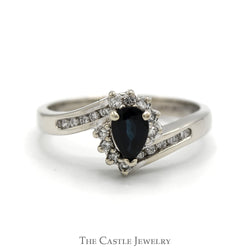 Pear Cut Sapphire Ring with Diamond Halo and Accented Sides in 14k White Gold