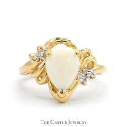 Pear Cut Opal Ring with Illusion Set Diamond Accented Sides in 14k Yellow Gold
