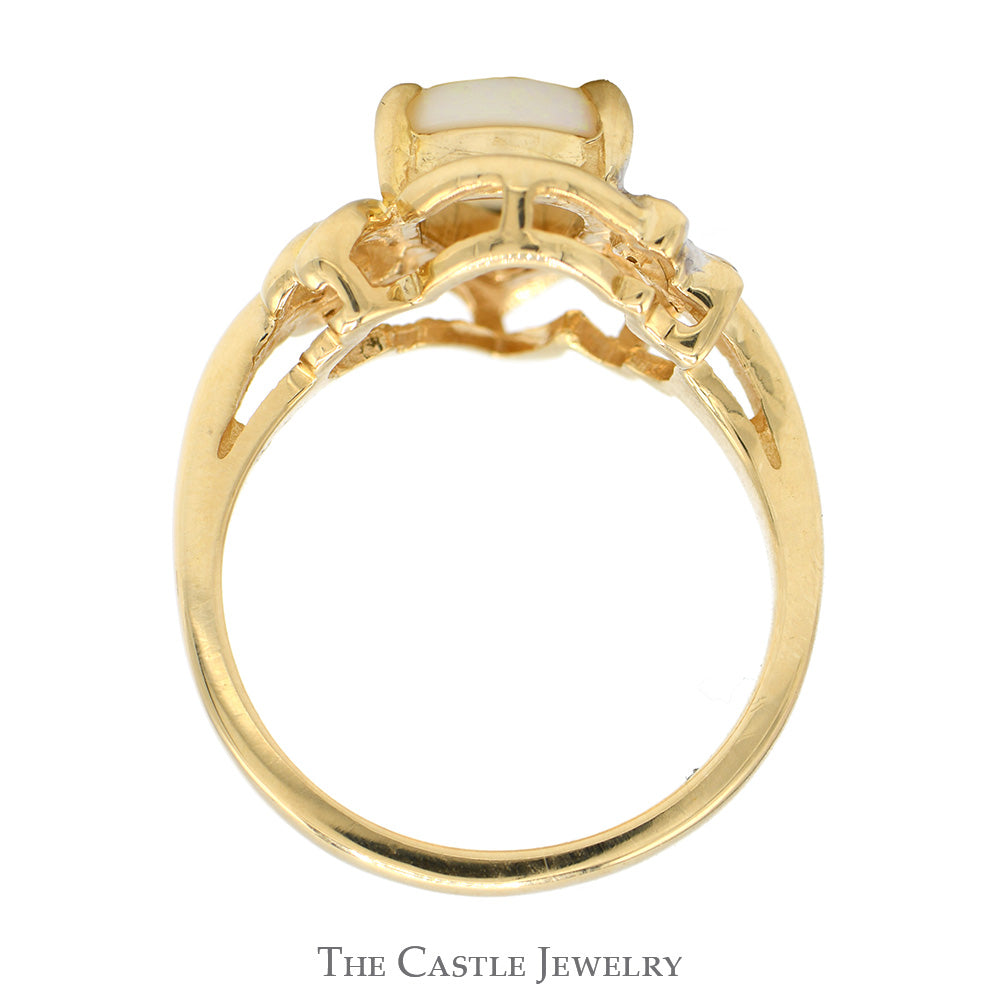 Pear Cut Opal Ring with Illusion Set Diamond Accented Sides in 14k Yellow Gold