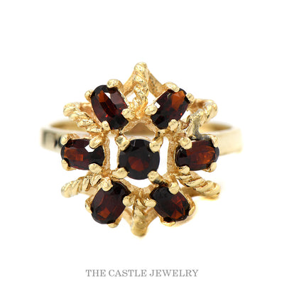 Oval Cut Garnet Flower Cluster Ring in 14k Yellow Gold