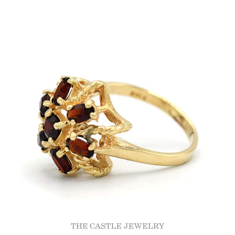 Oval Cut Garnet Flower Cluster Ring in 14k Yellow Gold