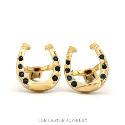 14k yellow gold horseshoe cufflinks with sapphire accents — top view