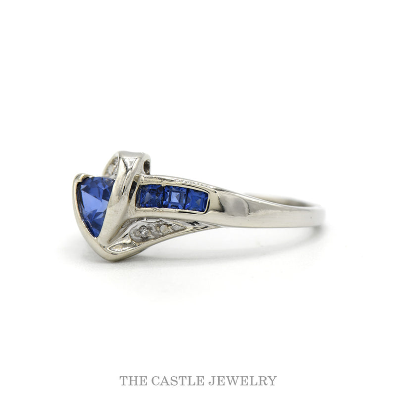 Side profile of the 10k white gold tanzanite bypass ring