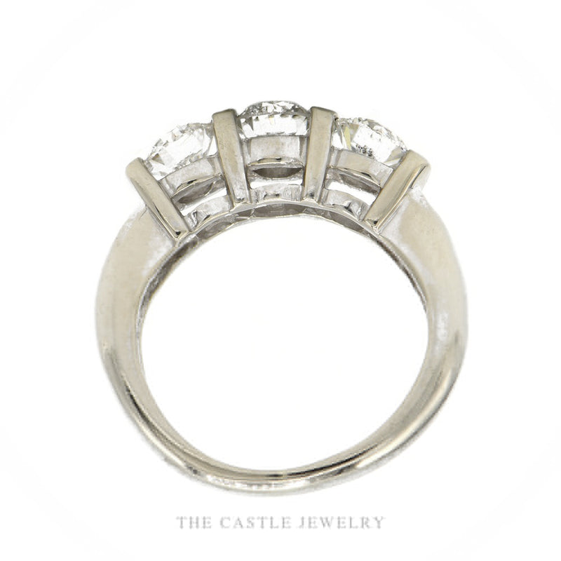 Front-facing view of the 14k white gold 3-stone tension-set diamond band