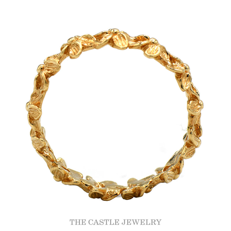 Front-facing view of the 14k yellow gold daisy eternity band