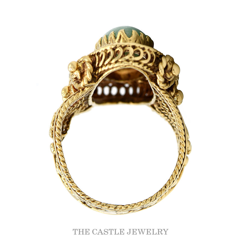 Front-facing view of the 14k yellow gold marquise jade filigree ring