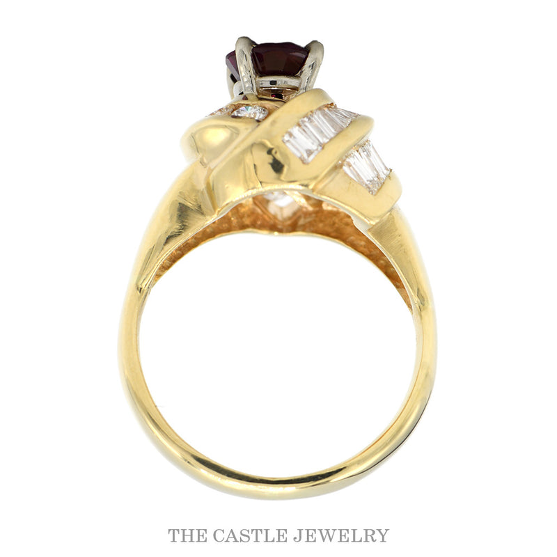 Front-facing view of the 14k yellow gold pear ruby ring