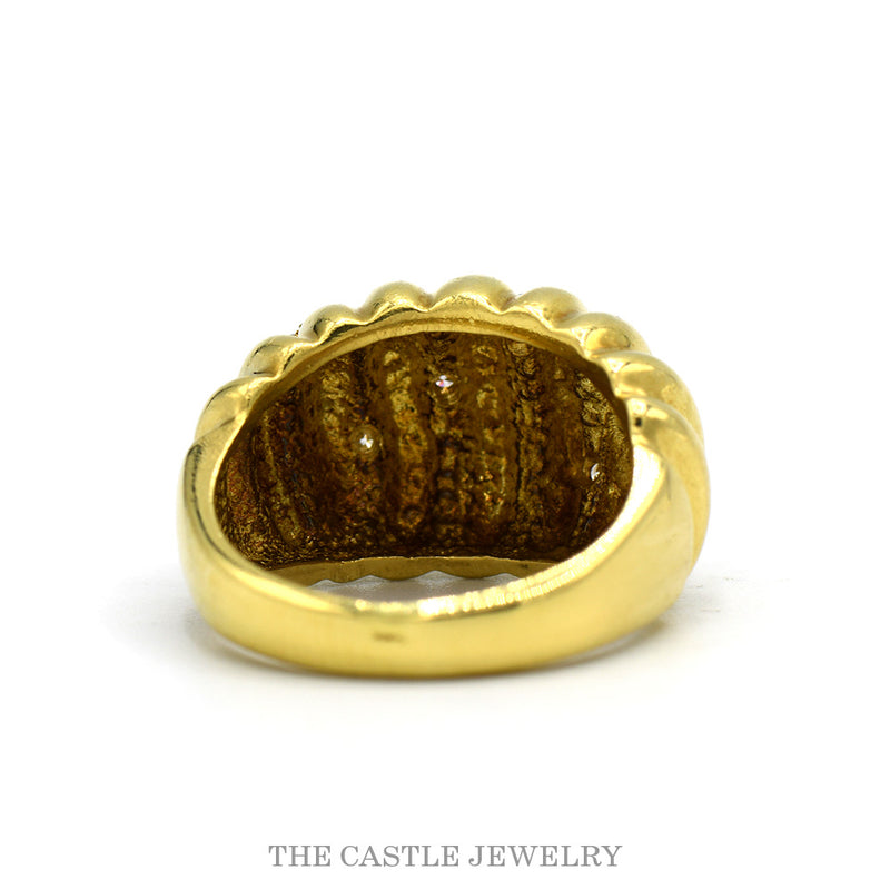 Front-facing view of the 18k yellow gold twist dome ring