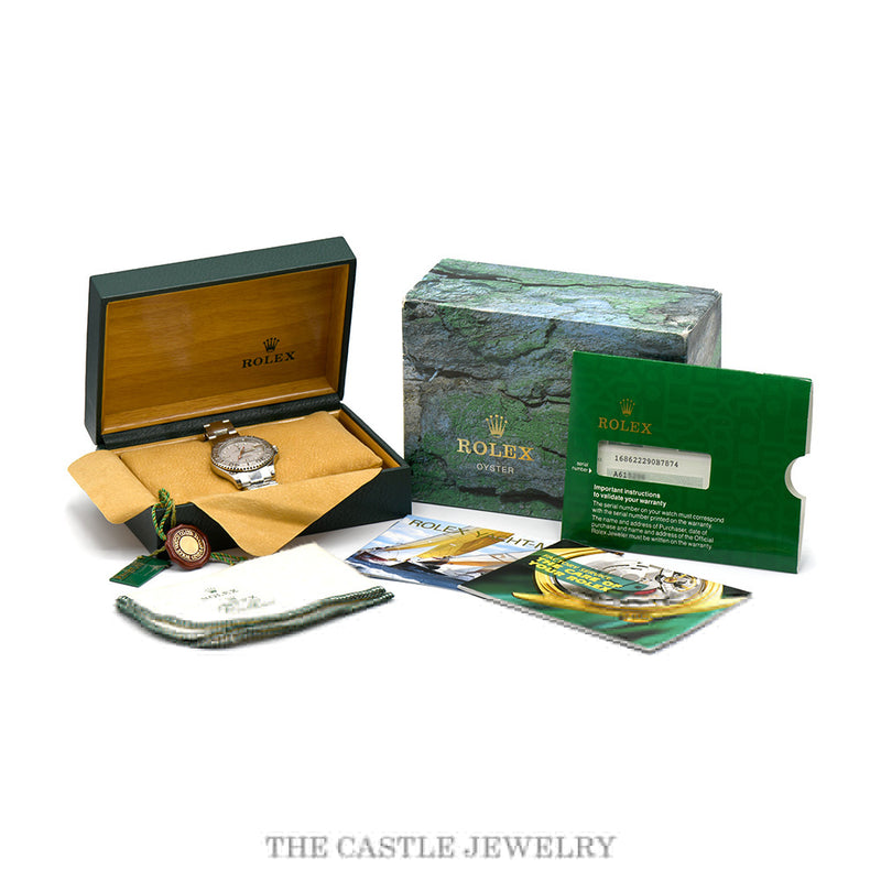 Complete set — Rolex box, warranty card, booklet, polishing cloth, hang tag