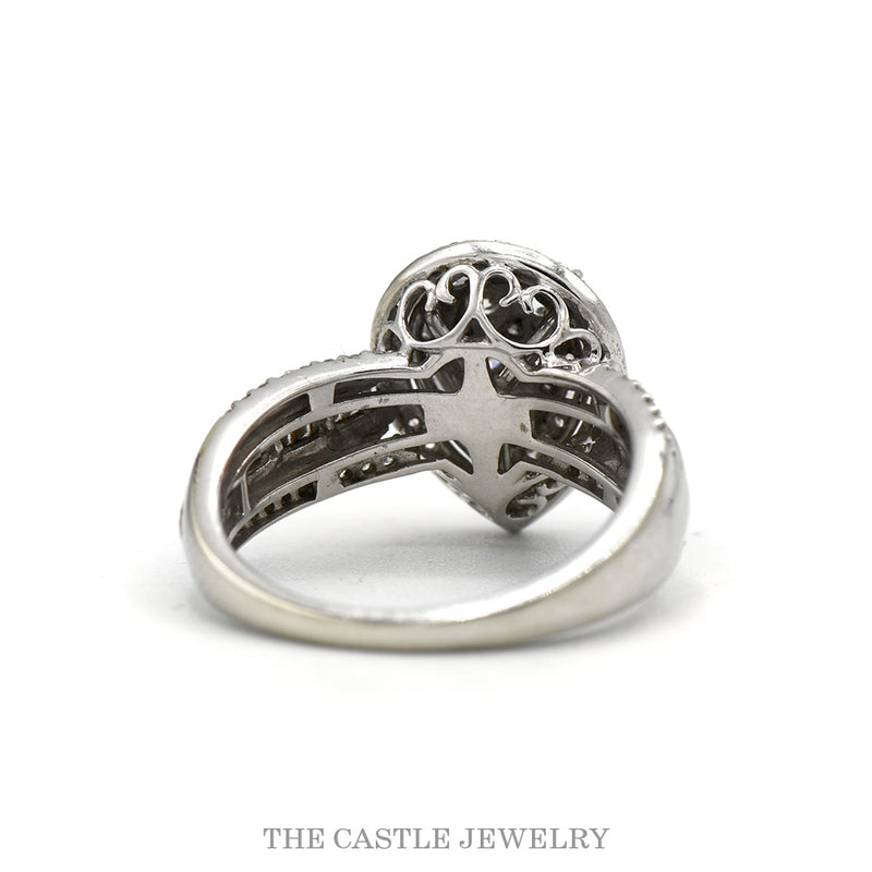 Front-facing view of the pear shaped diamond cluster halo ring in 14k white gold