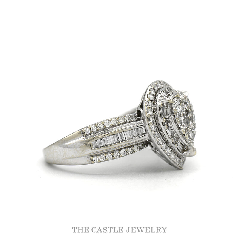Side profile of the 14k white gold pear cluster halo ring showing the three-row baguette shoulders