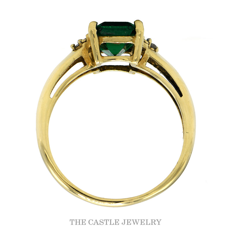 Front-facing view of the 10k yellow gold emerald ring