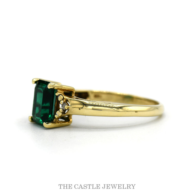 Side profile of the 10k yellow gold emerald ring