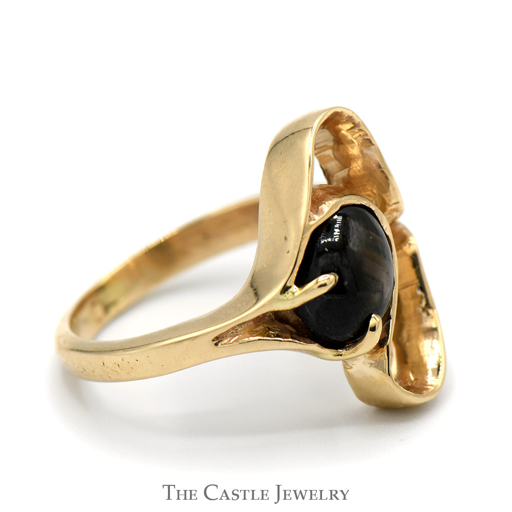 10k Yellow Gold Ring Featuring Open Free Form Design and Oval Cabochon Black Star Gemstone