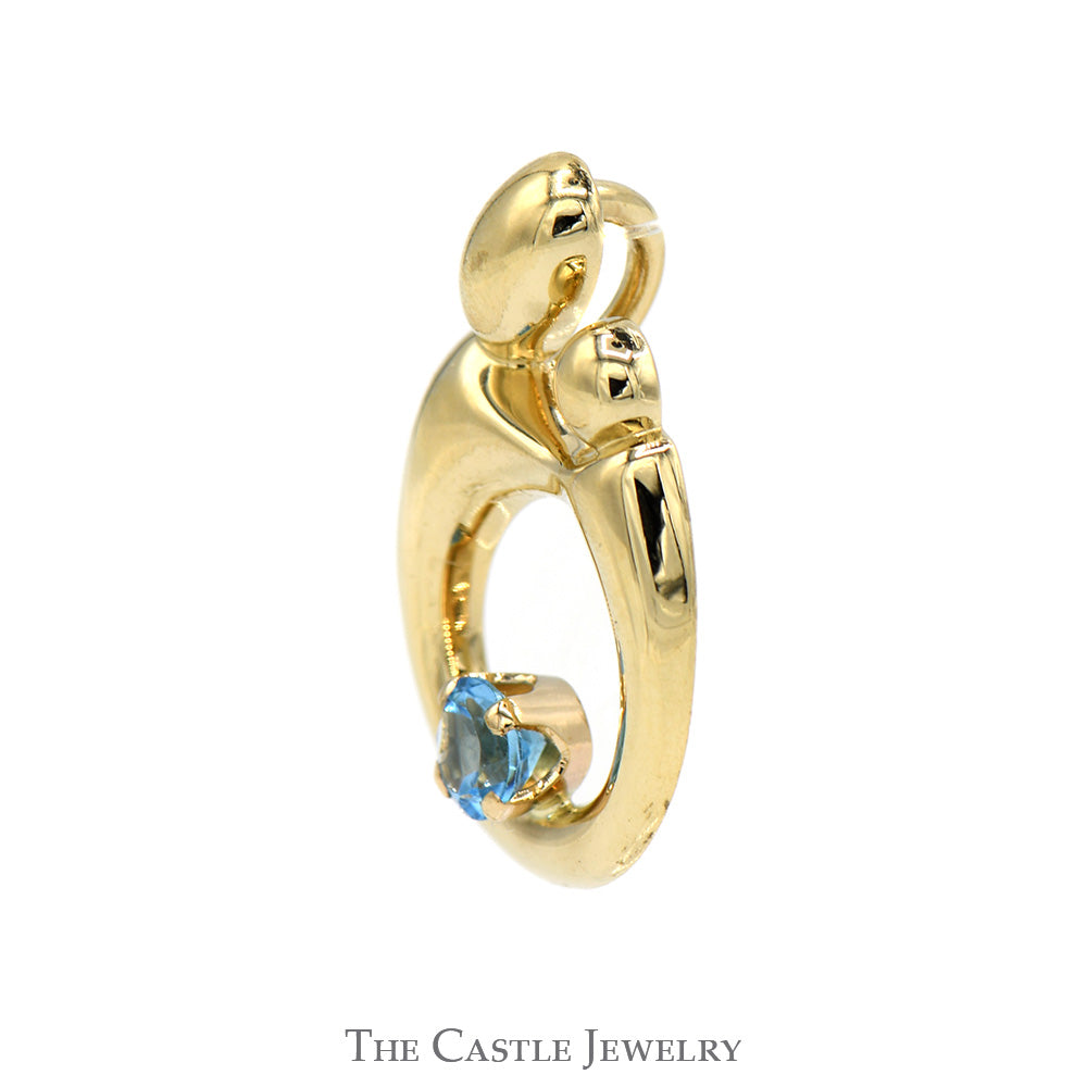 Mother and Child Pendant with Round Blue Topaz Accent in 14k Yellow Gold