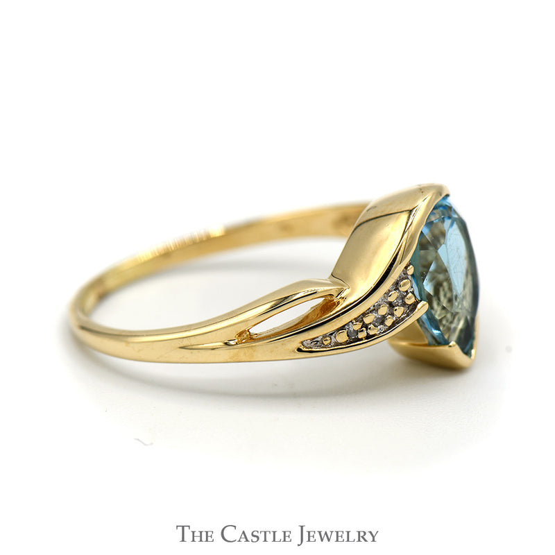 Pear Shaped Blue Topaz Ring with Illusion Set Diamond Accents in 10k Yellow Gold