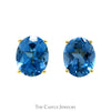 Oval Blue Topaz Studs in 14k Yellow Gold Basket Mounting - Thumbnail 1