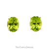 Oval Peridot Stud Earrings in 14k Yellow Gold Butterfly Pushbacks - Thumbnail 1